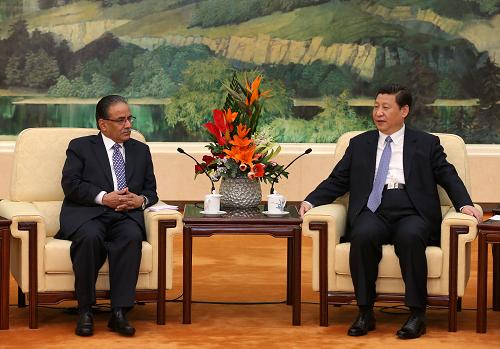 4月18日,中共中央总书记、国家主席习近平在北京人民大会堂会见尼泊尔联合尼共(毛)主席普拉昌达。新华社记者 庞兴雷 摄